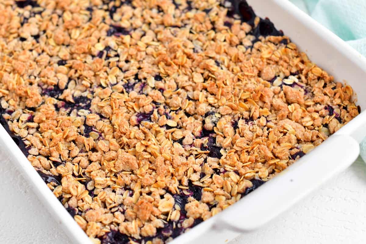 A baked blueberry crisp is fresh out of the oven.