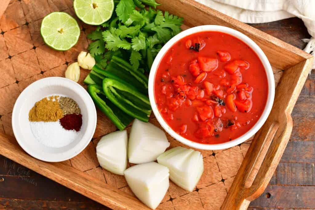 The ingredients for salsa are placed on a serving platter.