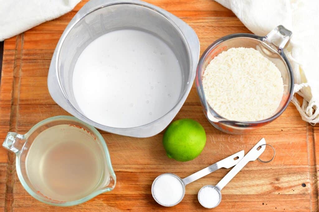 The ingredients for coconut rice are placed on a cutting board. 