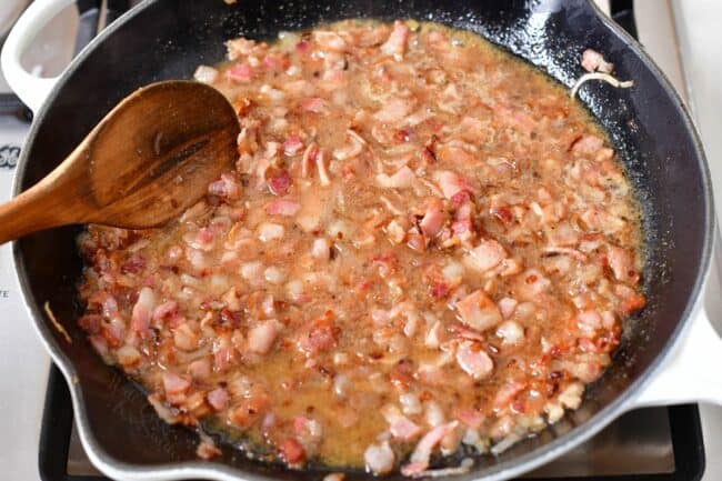 The dressing is cooked in a skillet. 