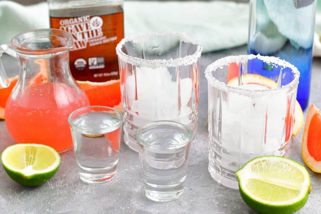 The ingredients for a paloma are placed on a kitchen counter.