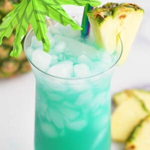top view of blue hawaii cocktail in the glass with pineapple