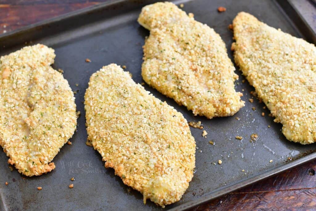 baked chicken on a metal sheet tray