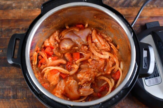 chicken, vegetables, and seasoning combined in an Instant Pot