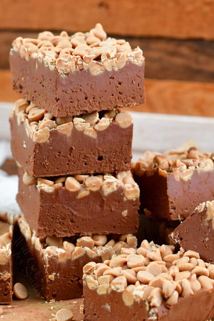 tall stack of chocolate peanut butter fudge squares