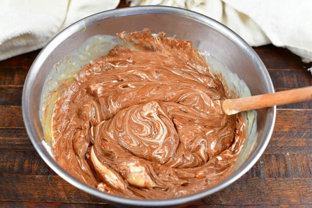 mixing fudge ingredients in a metal bowl