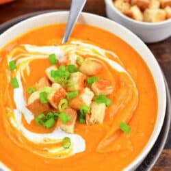 top view of sweet potato soup in a bowl with croutons