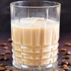 closeup of creamy light brown white Russian cocktail in a glass