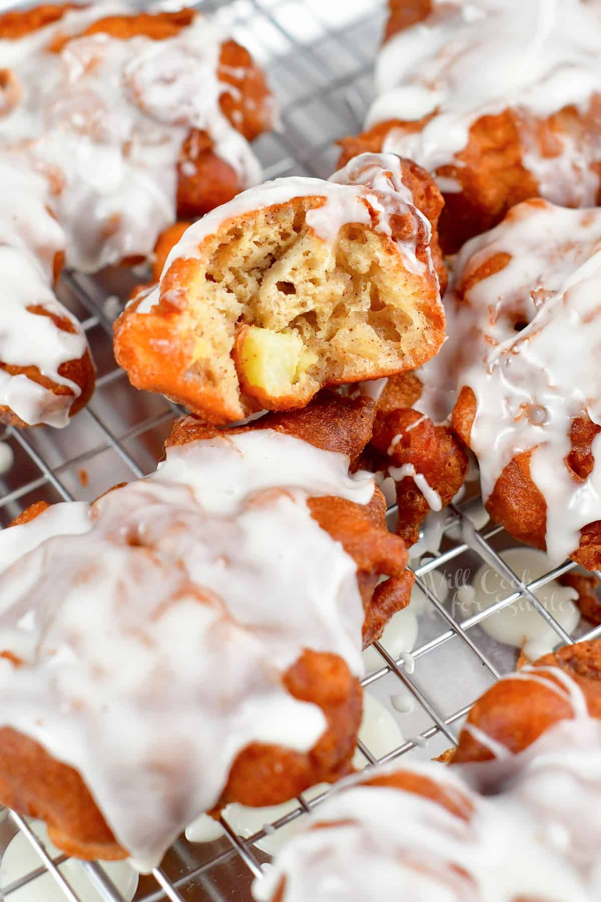 apple fritter in half on top of another apple fritter