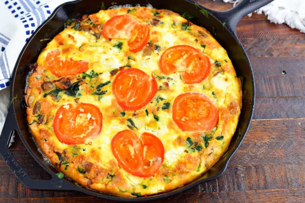 cooked frittata in a cast iron skillet