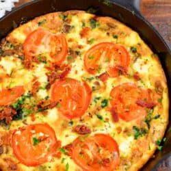 top view of a whole frittata in a cast iron skillet