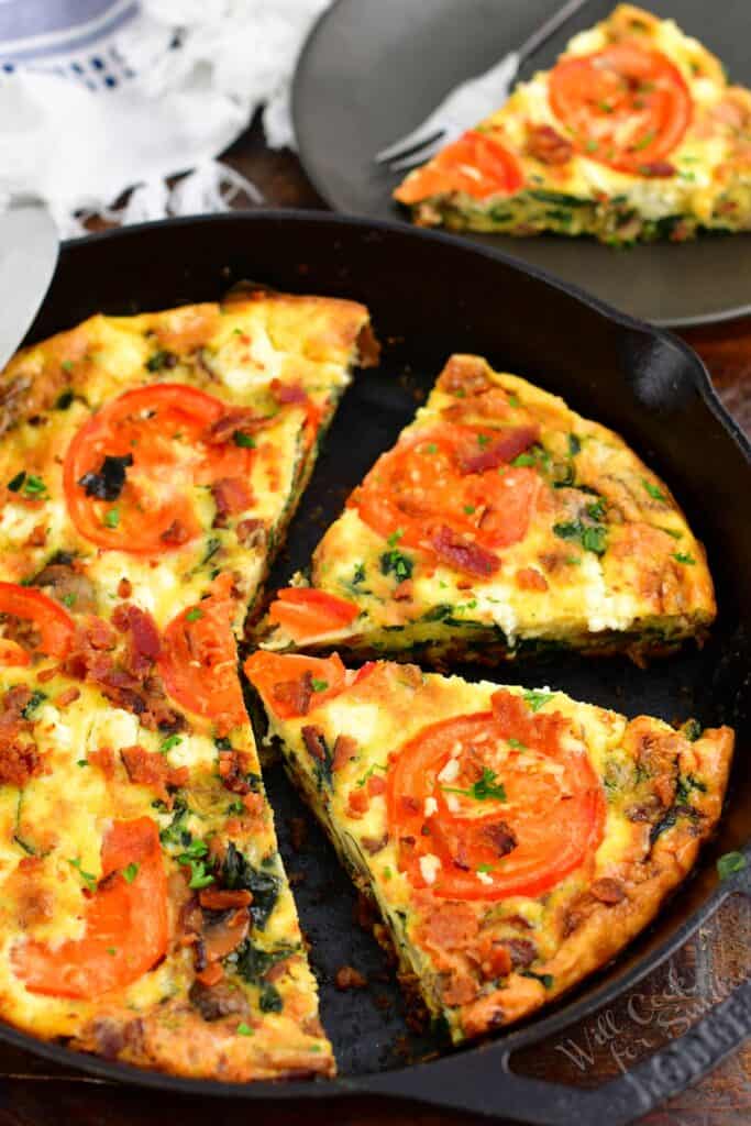 top view of sliced frittata in a cast iron skillet