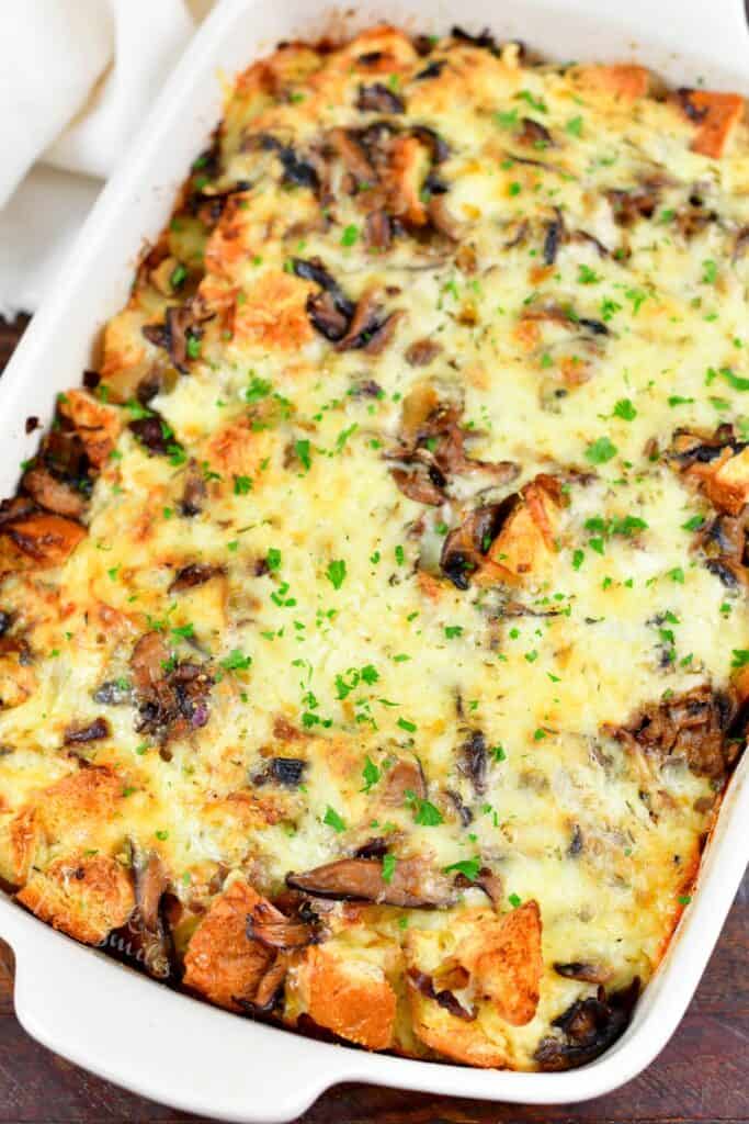 top view of the baked mushroom bread pudding in a dish