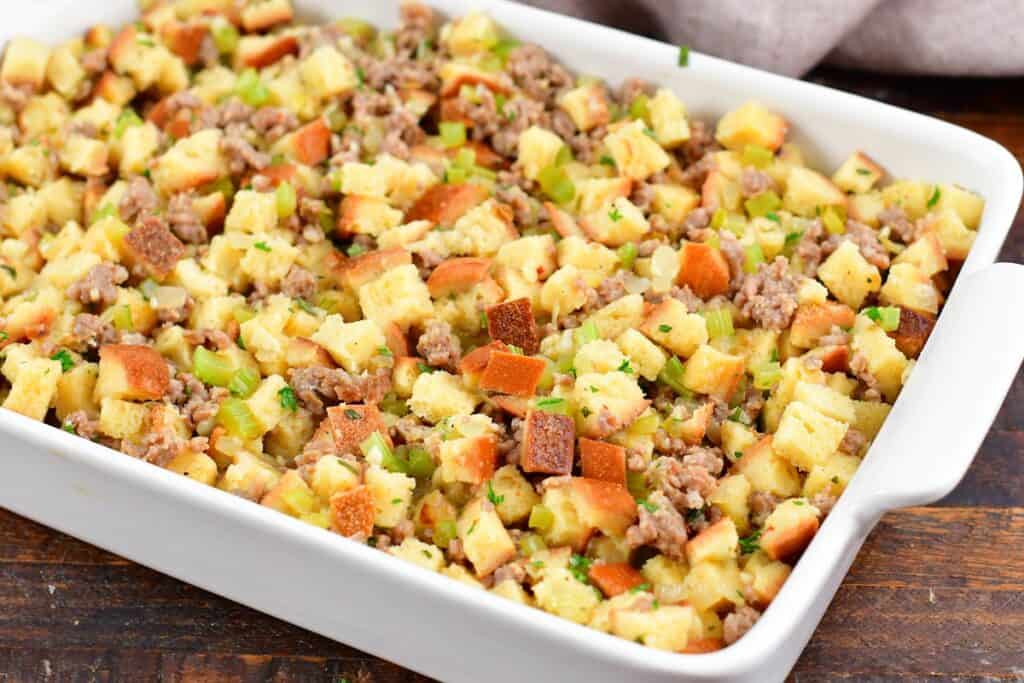uncooked sausage stuffing in a baking dish