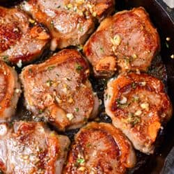 lamb chops in a cast iron skillet