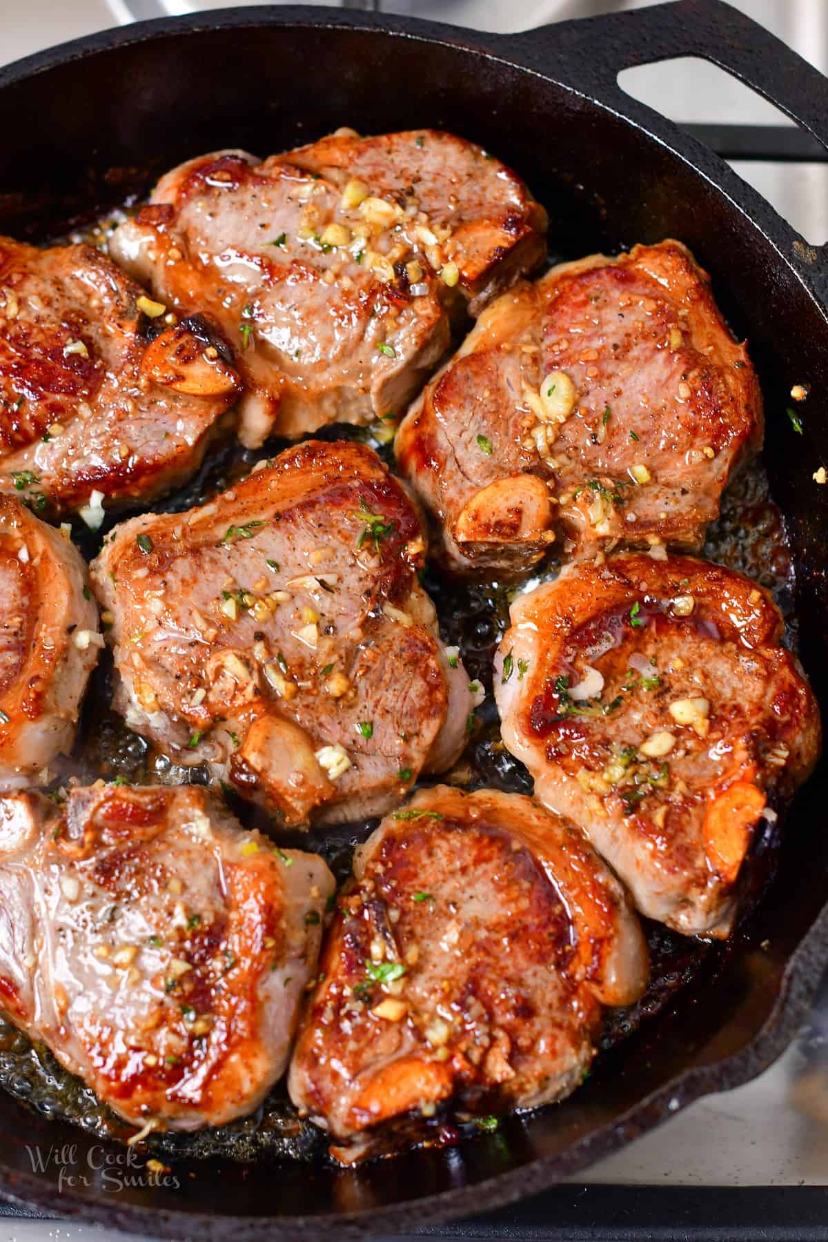 lamb chops in a cast iron skillet