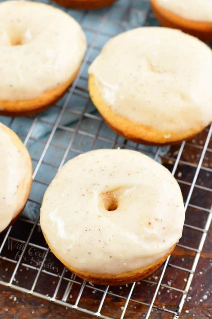 closeup of eggnog donut on the wire rack