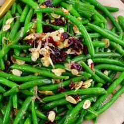 top view of green beans with cranberries and almonds