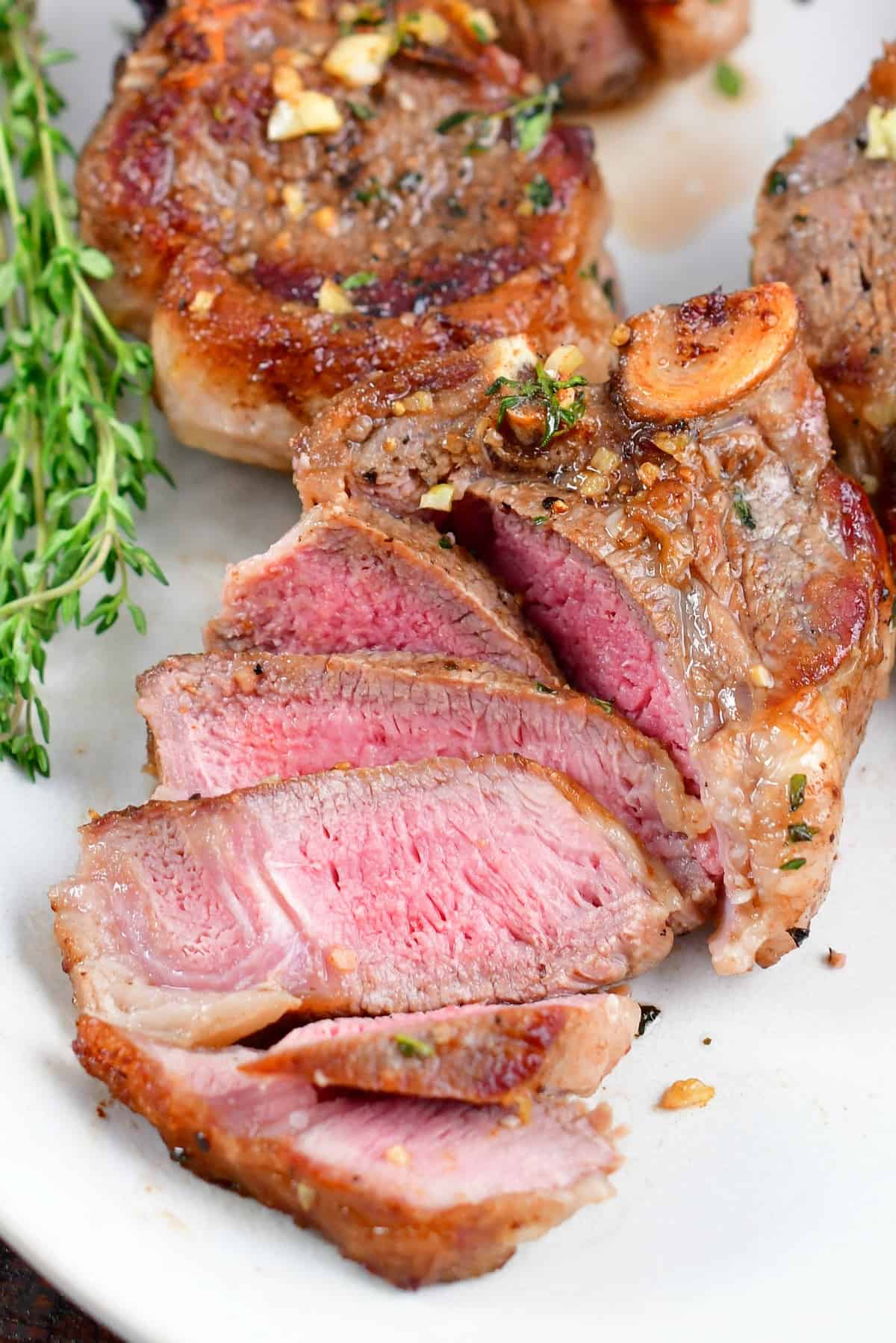 close up of sliced lamb on the plate