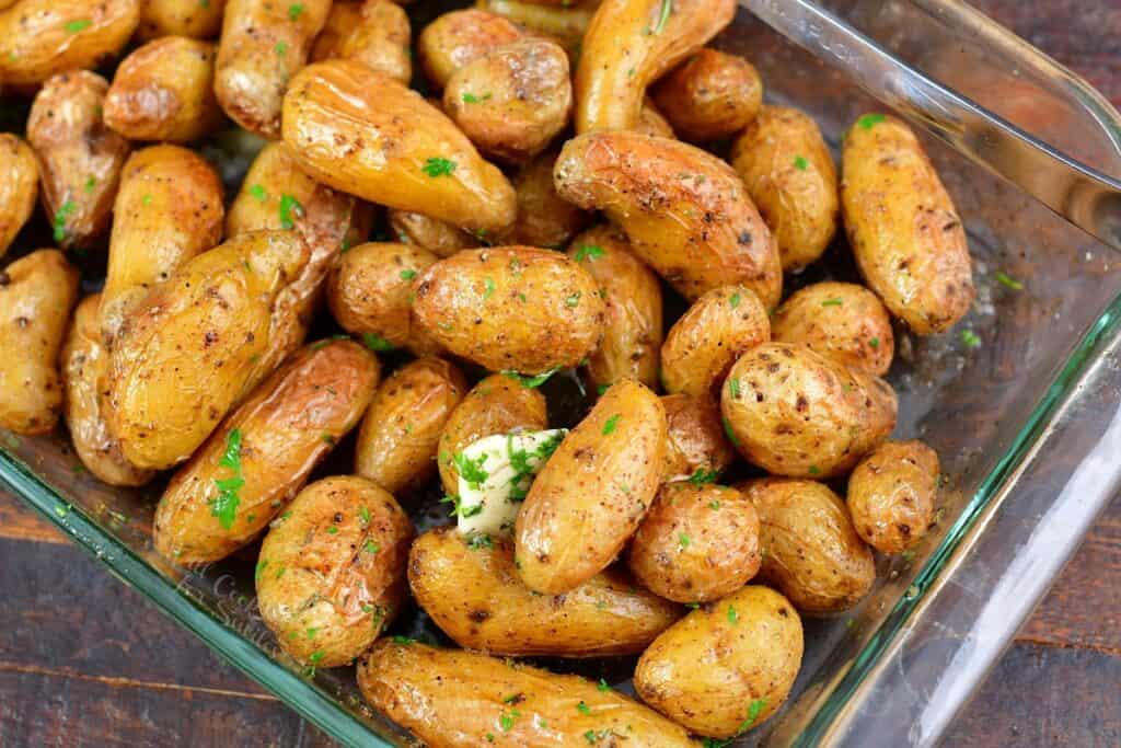 closeup of fingerling potatoes with herbs and butter