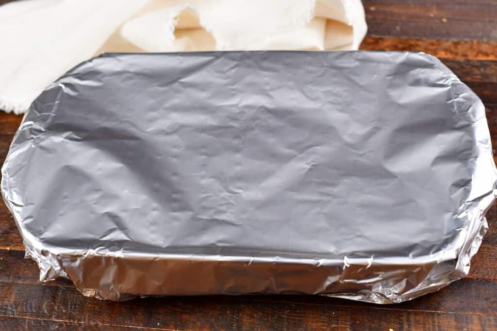 baking dish covered with aluminum foil