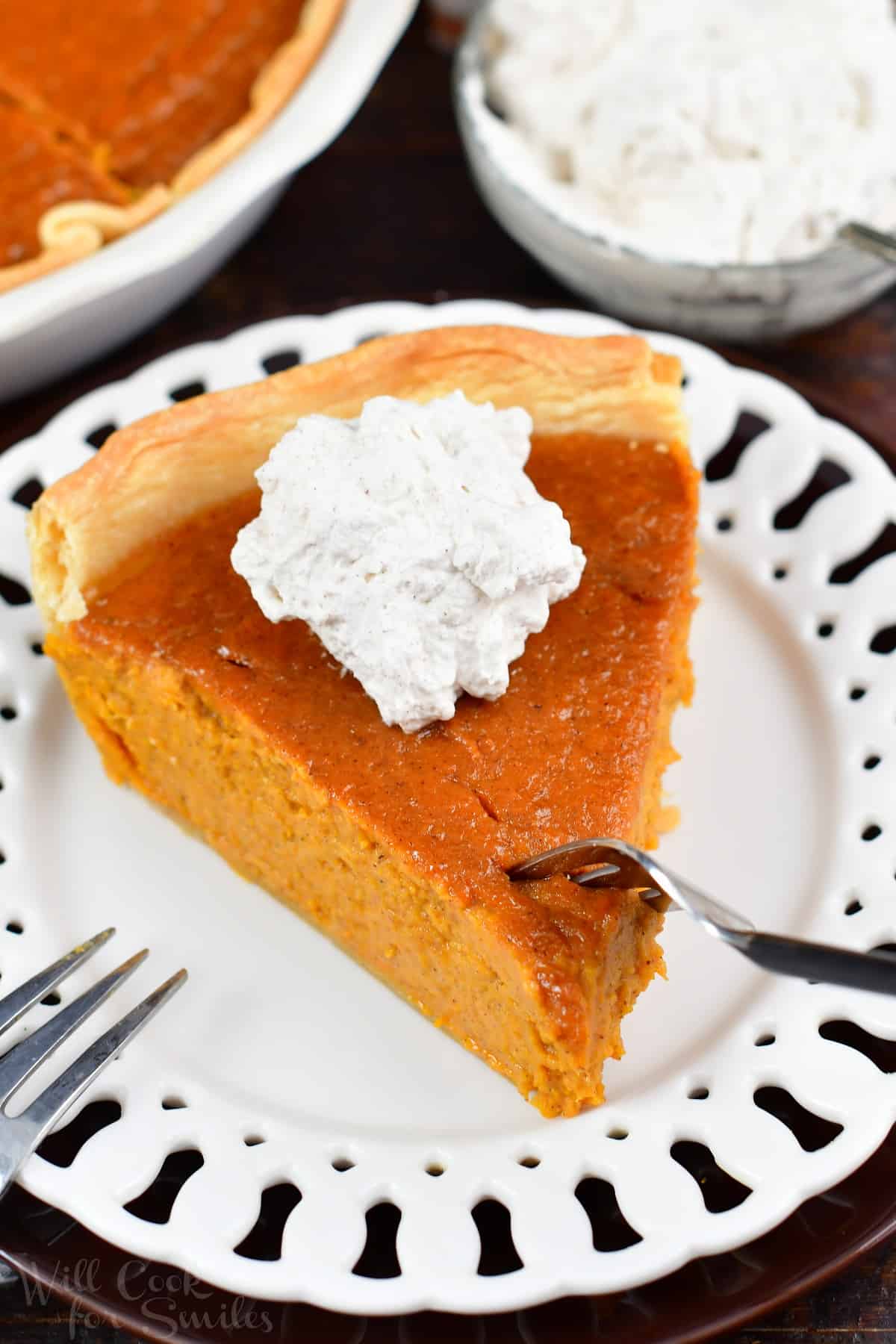 fork going through a slice of sweet potato pie