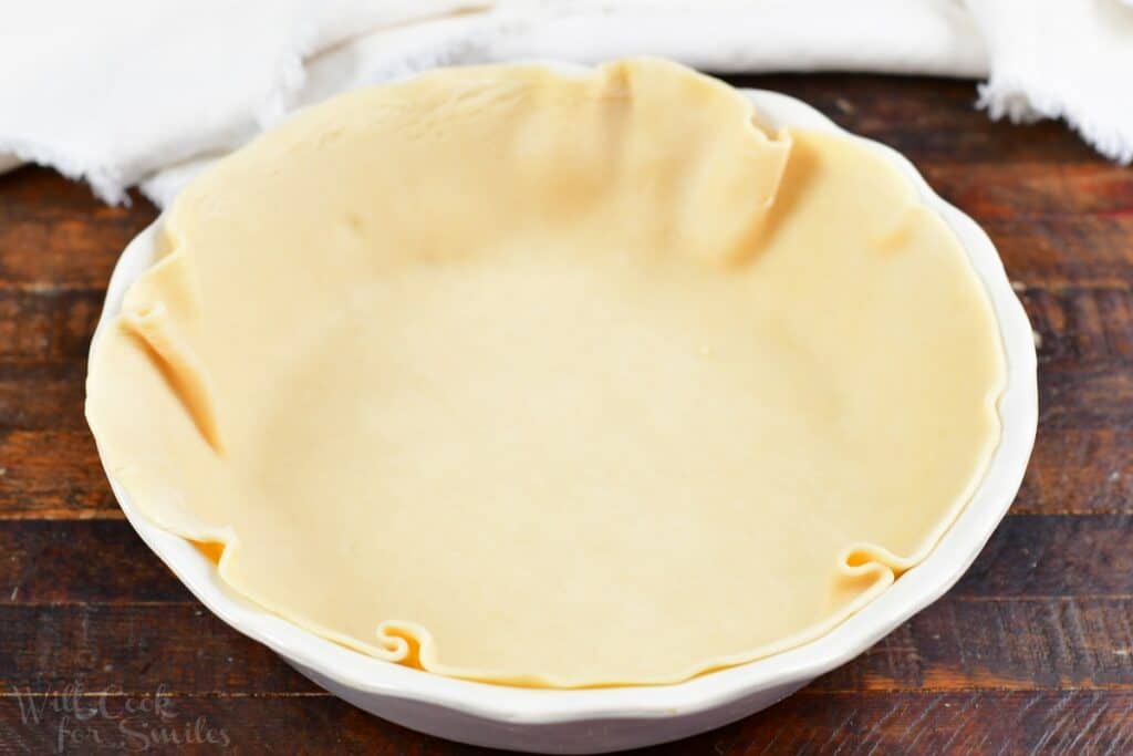 pie crust fitted into the pie dish
