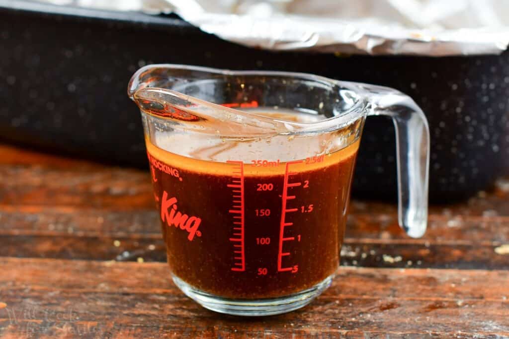 pan drippings strained in a measuring cup