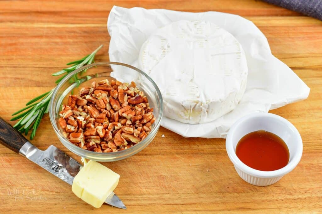 ingredients for simple baked brie on a cutting board