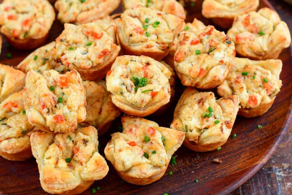 closeup of crab puffs stacked on a plate