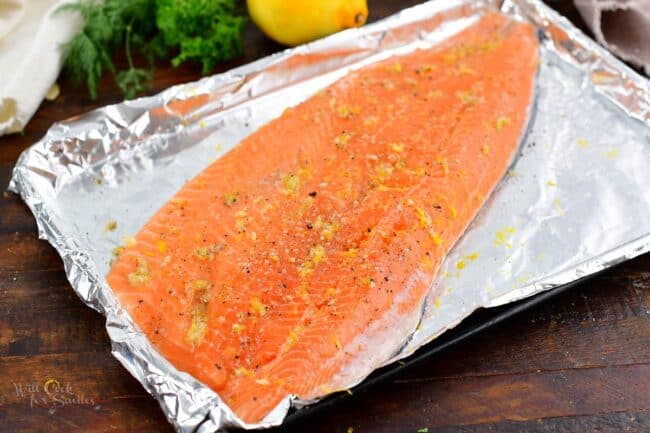whole salmon rubbed in seasoning and lemon zest