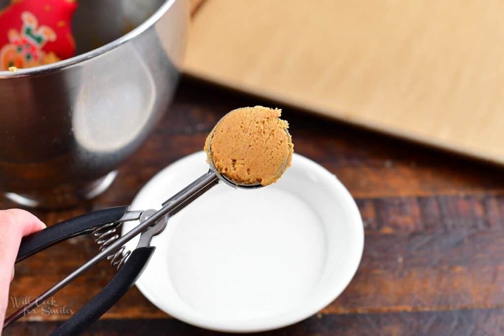 cookie scoop with cookie dough in it