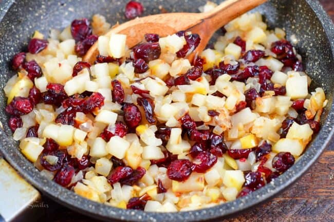cranberry pear topping cooked in a pan
