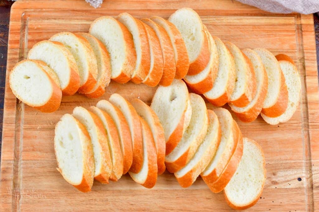 sliced baguette on a cutting board