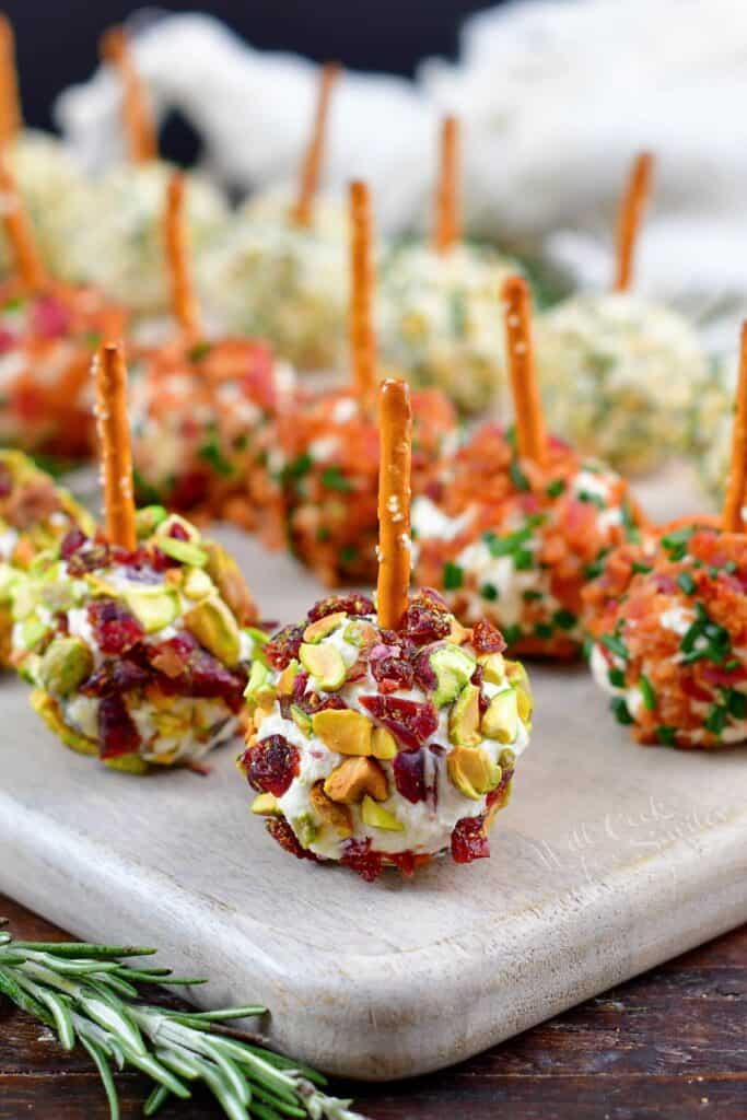 closeup of cranberry pistachio mini cheese ball