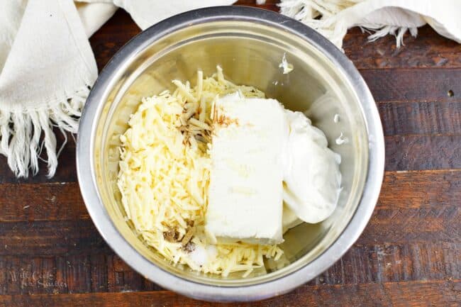 ingredients for cheese ball mixture in a mixing bowl