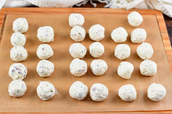 rows of rolled cream cheese mixture into balls
