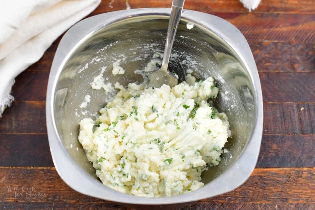 mixed ricotta filling in a small mixing bowl