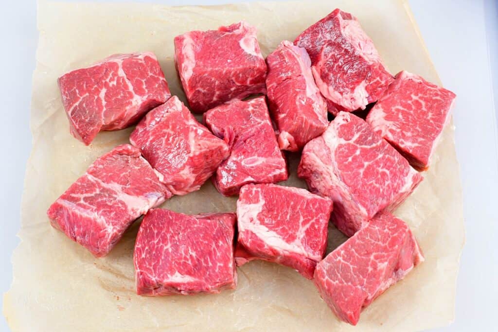 boneless short ribs in the cutting board