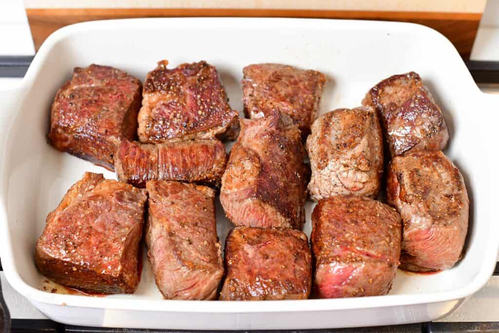 seared short ribs in the baking dish