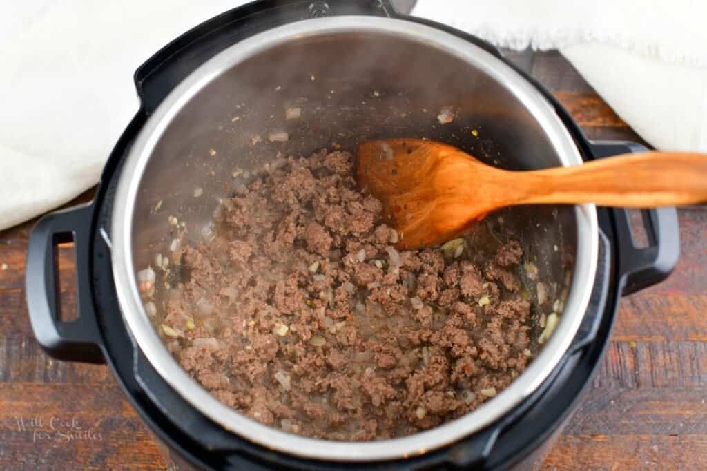 cooked ground beef with veggies in instant pot
