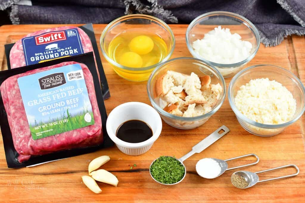 ingredients for meatballs on the cutting board