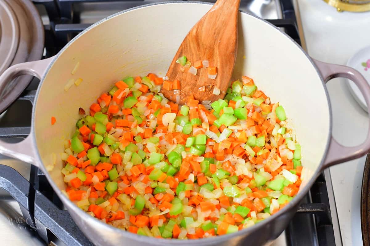 onions, celery, and carrots sautéing in the pot