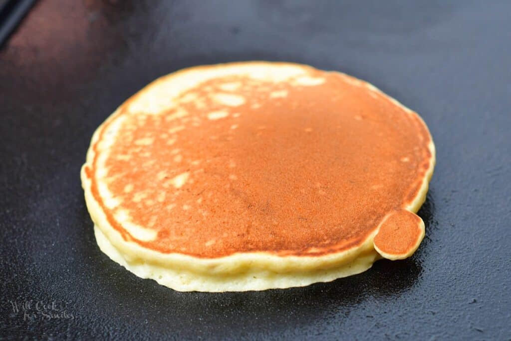 pancake cooking on the griddle