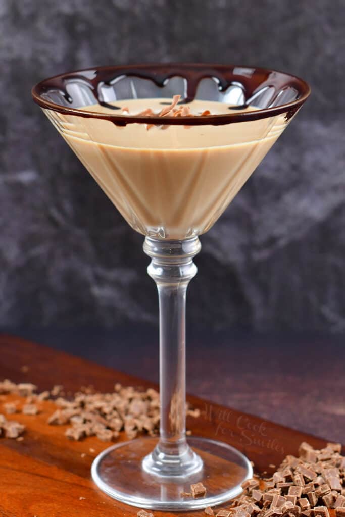 side view of a tall martini glass with chocolate martini