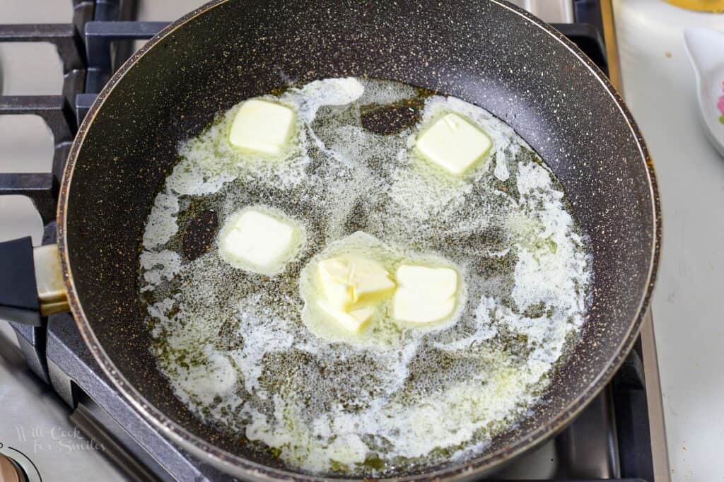 melting butter in a large deep pan