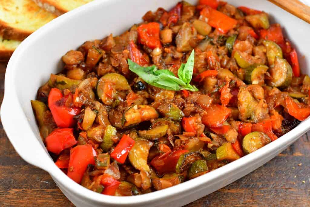 closeup of ratatouille in a white serving dish