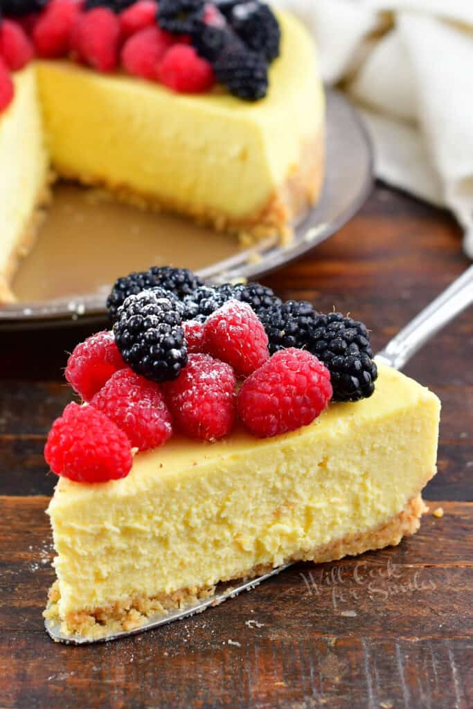 slice of ricotta cheesecake topped with berries