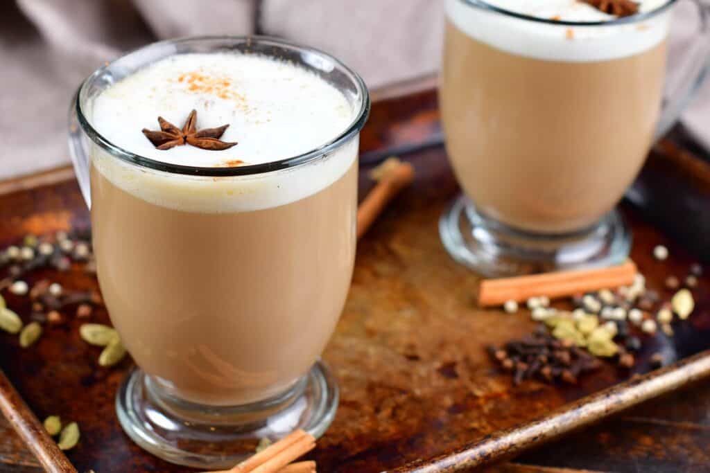 closeup of the mug with chai tea latte and start anise