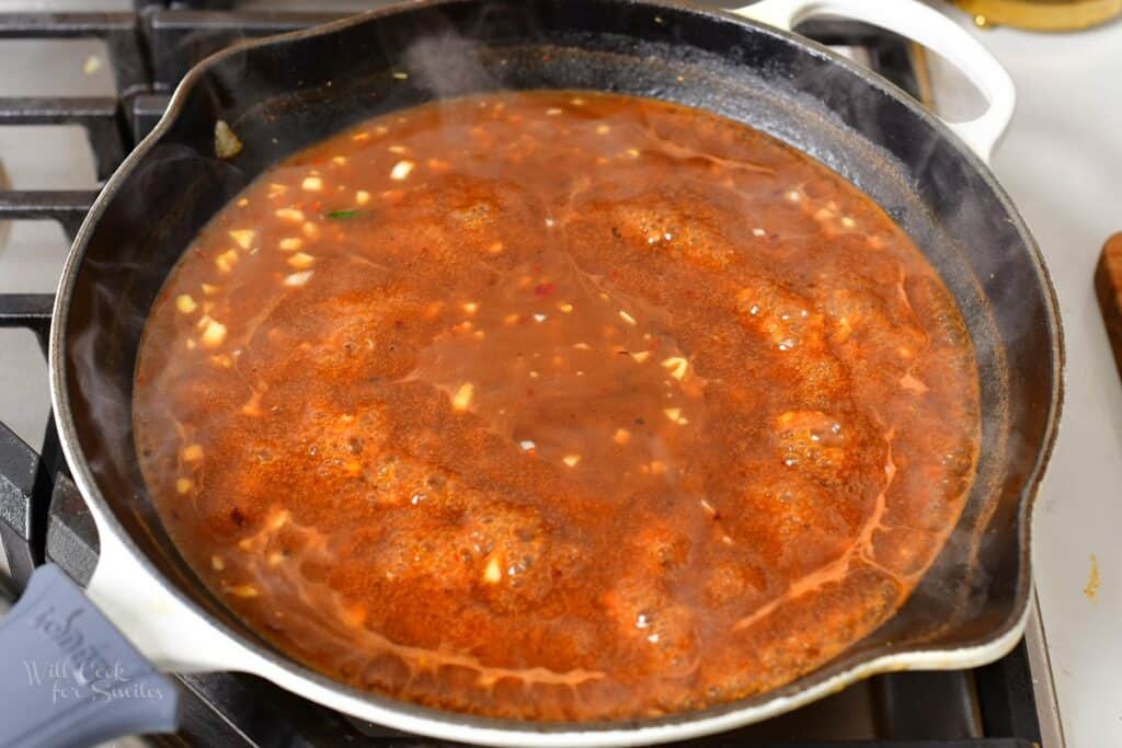 sauce simmering in a skillet